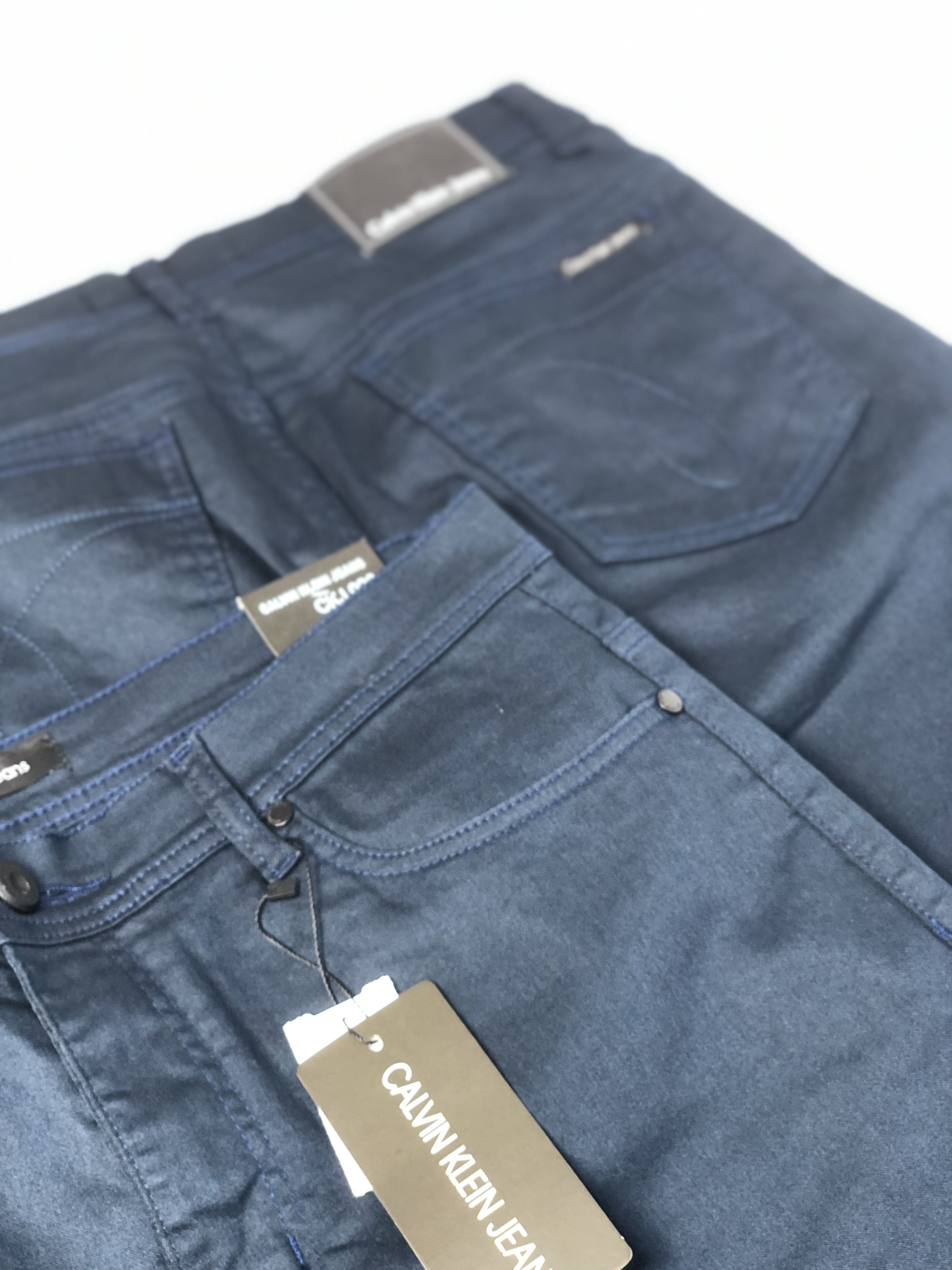CALÇA SARJA ACETINADA CALVIN KLEIN